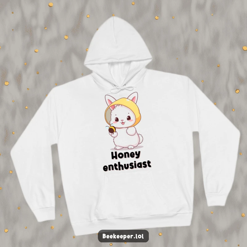 Funny fluffy bunny in a beekeeper veil, cheerfully holding a tiny buzzing bee on a warm hoodie, embodying gentle friendship.