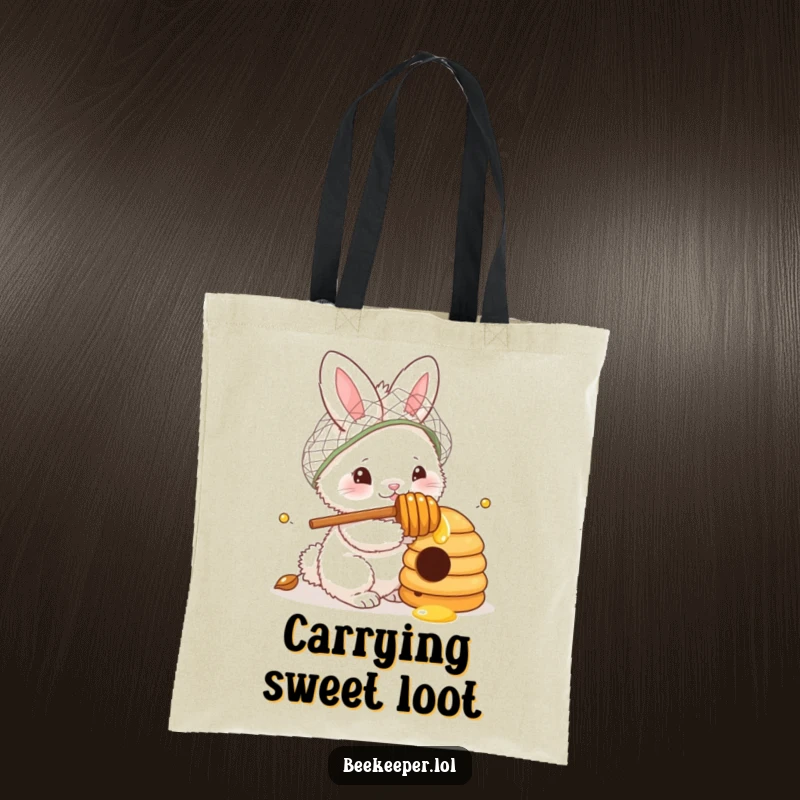 Funny Tote Bag: A fluffy bunny wearing a netted hat and holding a honey dipper, curiously peeking into a beehive, a whimsical and charming design.